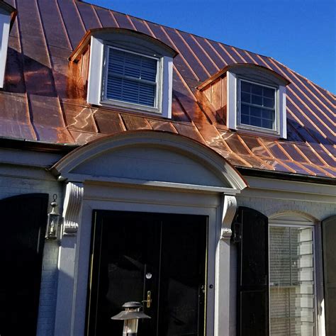 copper metal roof on brick house|brick house with black shingles.